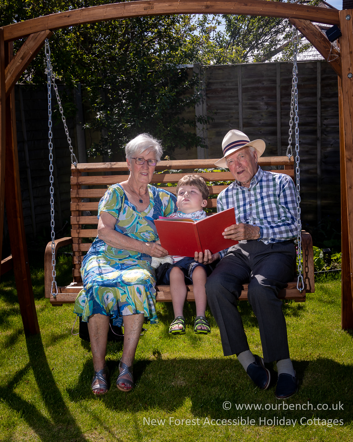 Sam relaxing in the garden with his grandparents